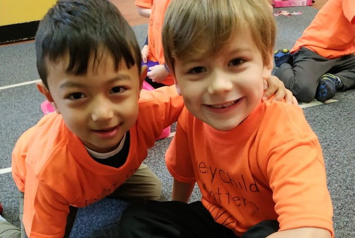 To mark Orange Shirt Day, students wrote “every child matters” and traced their handprint on an orange shirt before undertaking a neighbourhood walk to raise awareness of residential schools.