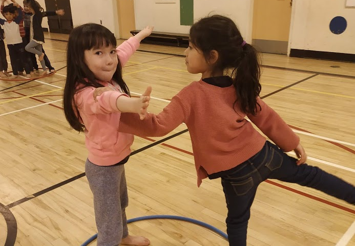 Students learn dance from a specialist instructor