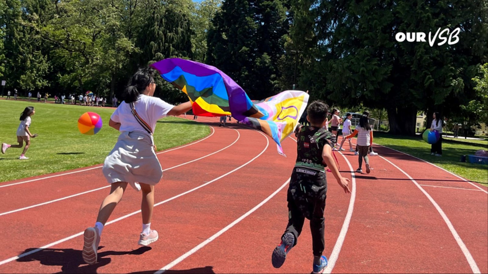 Students running with flag